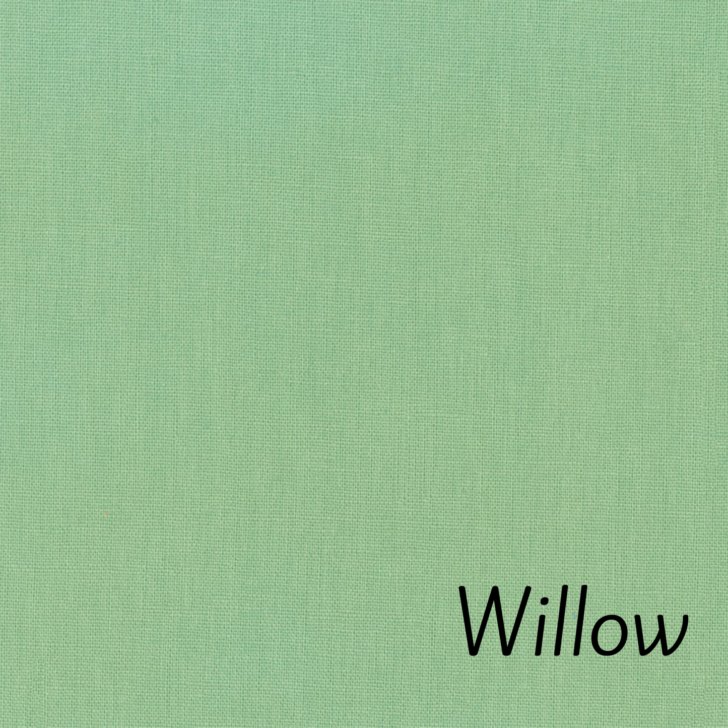 Robert Kaufman Essex Linen Blend Fabric. 55%Linen 45% Cotton. Color Willow is a solid green. Available by the cut fat quarter to yard.