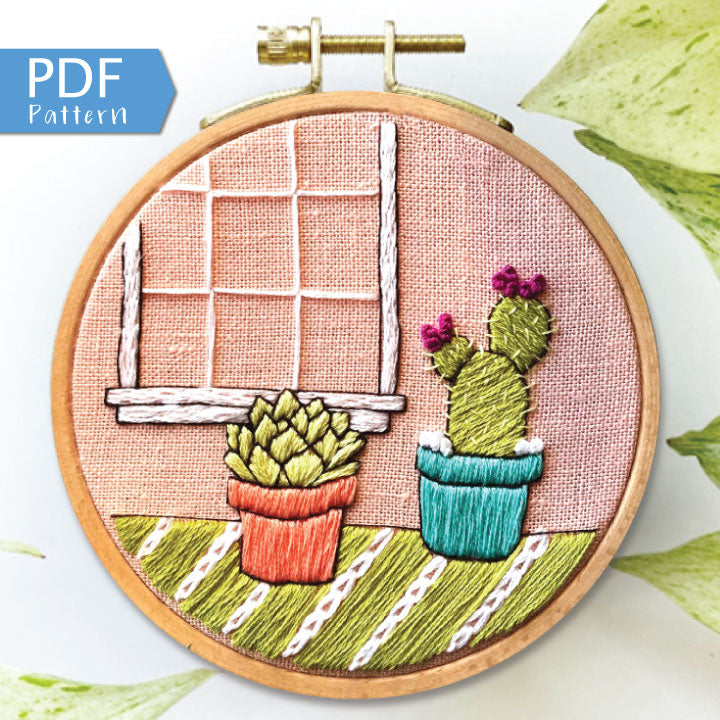 Cozy Cactus PDF includes pattern for image transfer and 11 page booklet with easy to follow directions to complete. Two cute cactus sit in front of a window.