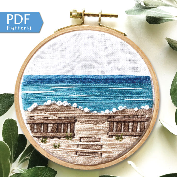 A Day at the Beach Modern Embroidery PDF contains a 12 page booklet of easy to follow directions so you can complete this beach scene with crashing waves on a sandy beach with a rustic fence.