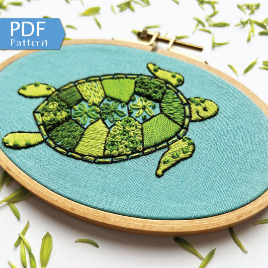 Green Sea Turtle Hand Embroidery PDF.  12 page booklet gives clear directions to complete this modern sampler with 7 different stitches.  Create your own masterpiece. Turtle with 13 shell sections with different stitch types.