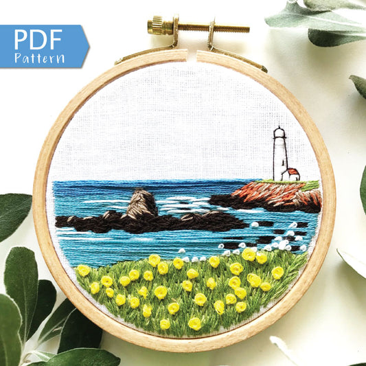 Lighthouse by the Bay PDF. Download includes easy to follow directions.  Hand Embroidery has lighthouse on the right hand side on cliff with rocks and ocean to the horizon.  Grass and flowers fill the foreground.