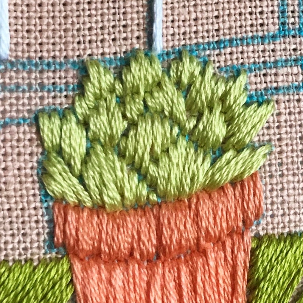 Stitch detail of small cactus in Cozy Cactus PDF. Each leaf is clearly defined.