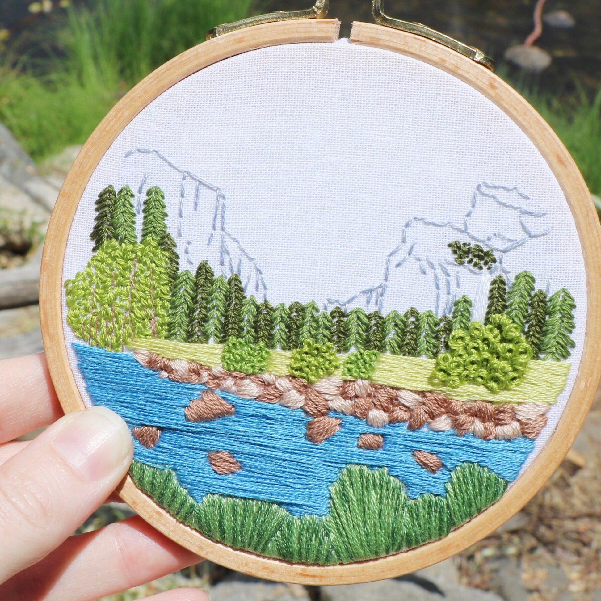 Yosemite Valley Hand Embroidery PDF pattern.  Half Dome graces the background of this modern embroidery with river, rocks and trees in the foreground.