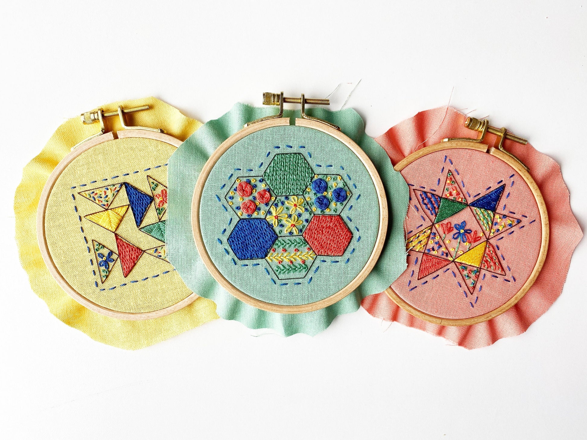 Rosanna Diggs Embroidery Hexie Harmony PDF.  Design features a modern take on the traditional paper pieced hexagon quilt pattern. Part of the RDE Modern Quilt Sampler collection including Seeing Starflowers and Triangle Tango,