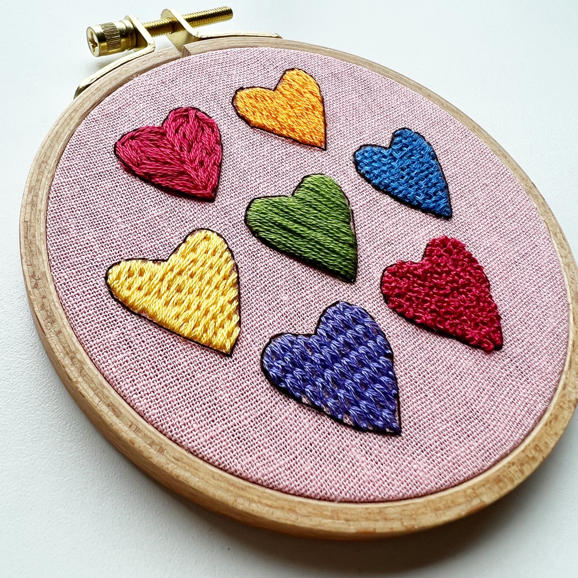 I Heart Stitching Complete Beginner Embroidery Kit.  Seven hearts in seven colors and stitch styles.