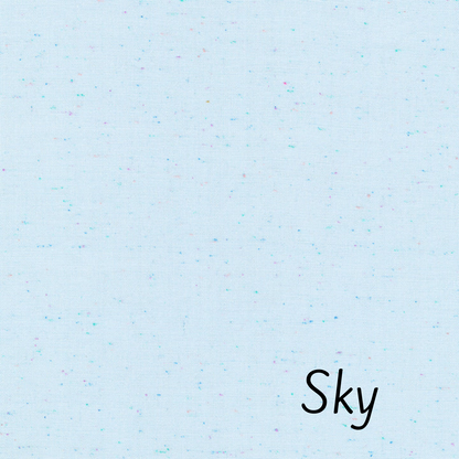 Robert Kaufman Essex Speckle Linen Blend in Sky.  Light blue with flecks of darker blue, pink and turquois.