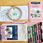 What is Included: 4 inch wooden hoop, 6 inch square linen fabric, water soluble pen, full skeins of floss, needle, pattern, step-by-step instructions and felt for backing in a reusable zippered project bag.