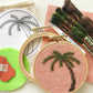 You will need: 4 inch wooden hoop, 6 inch square linen fabric, water soluble pen, 6 strand embroidery floss, needle, felt for backing, pattern, step-by-step instructions