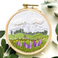 Mount Rainier Embroidery PDF.  Includes pattern for image transfer and 14 page booklet of easy to follow directions to complete.  Image has Mt Rainier in back with lupine and other small flowers in the foreground.