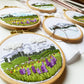 Mount Rainier Embroidery PDF.  Includes pattern for image transfer and 14 page booklet of easy to follow directions to complete.  Image has Mt Rainier in back with lupine and other small flowers in the foreground.