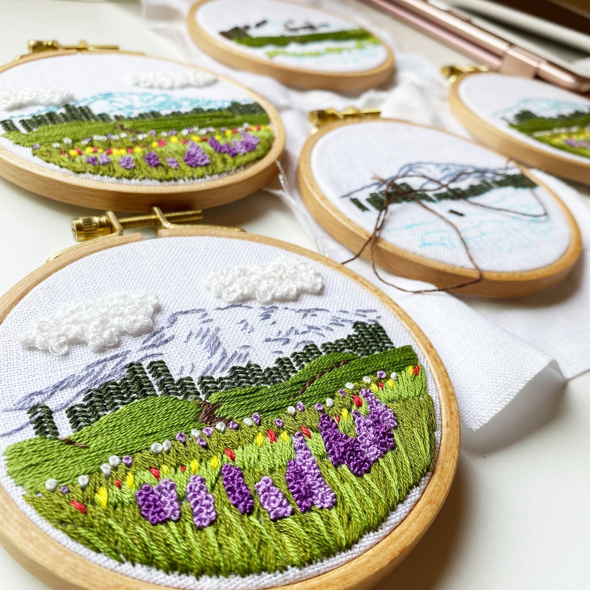 Mount Rainier Embroidery PDF.  Includes pattern for image transfer and 14 page booklet of easy to follow directions to complete.  Image has Mt Rainier in back with lupine and other small flowers in the foreground.
