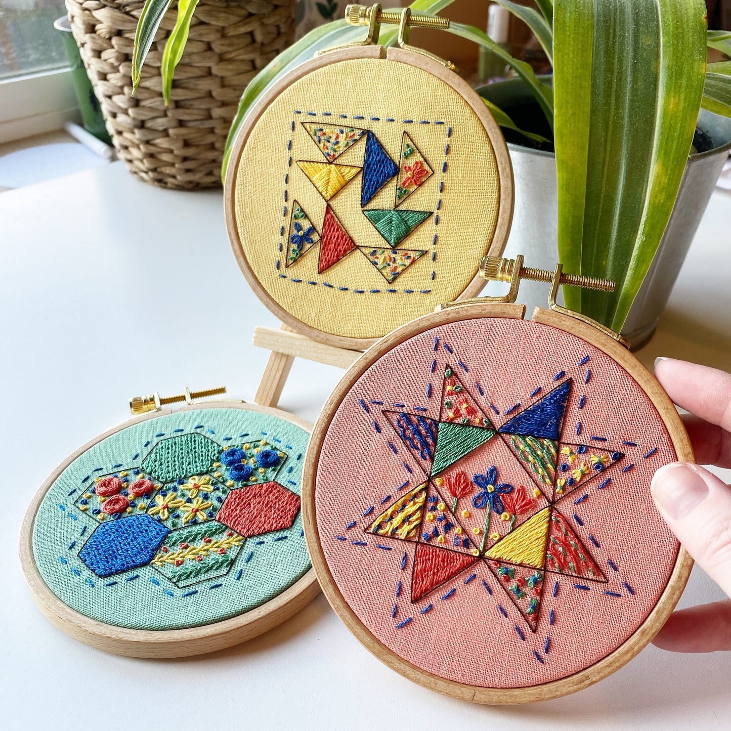 Rosanna Diggs Embroidery Triangle Tango PDF.  Design features a modern take on the traditional flying geese quit pattern. The Modern Quilt Sampler Collection also includes Hexie Harmony and Seeing Starflowers.  Available in PDF or Kit.